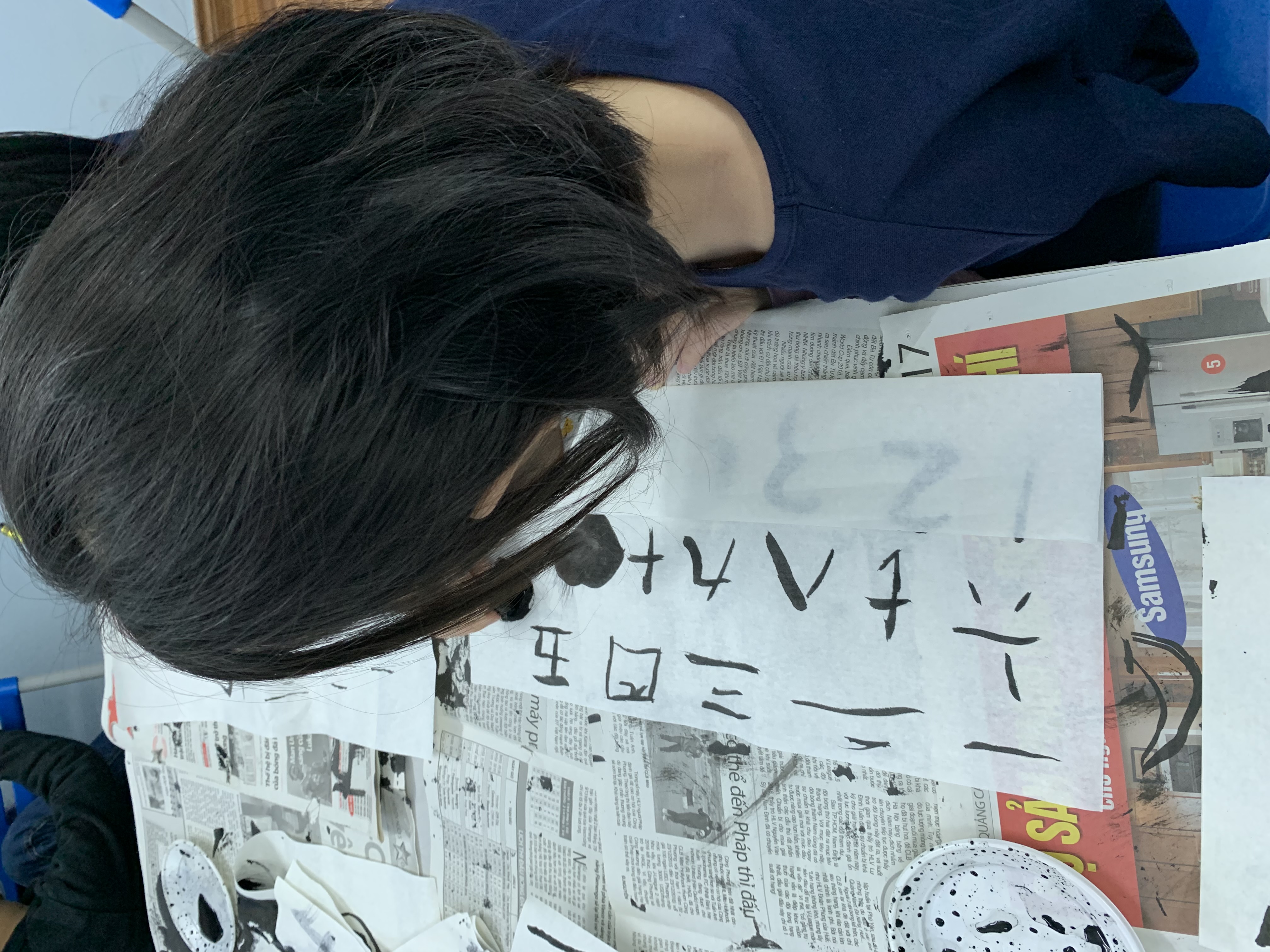 小朋友嘗試寫數字