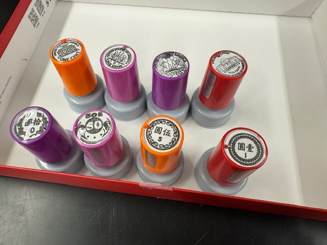 玩遊戲的硬幣印章。