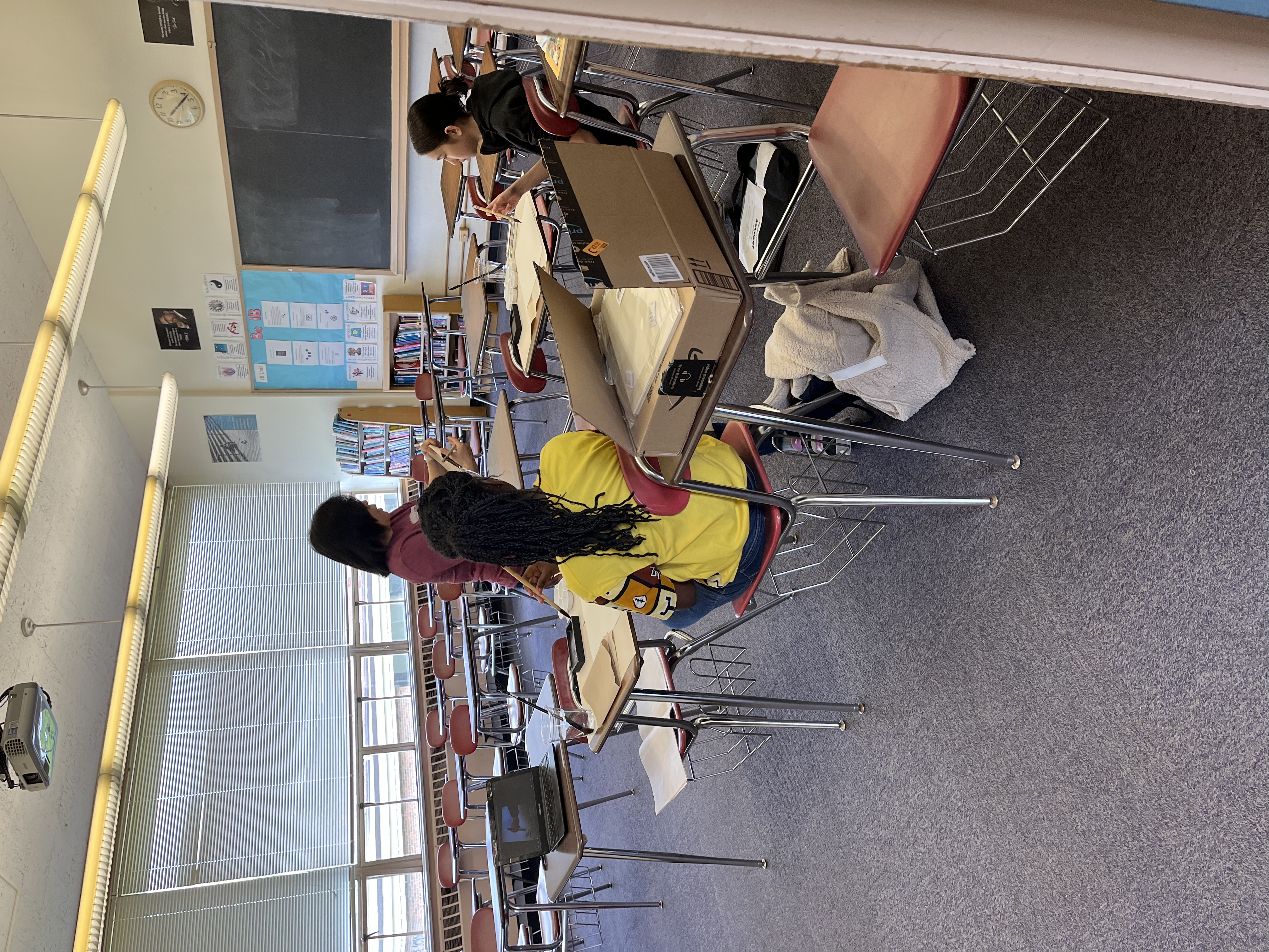 老師指導毛筆用法