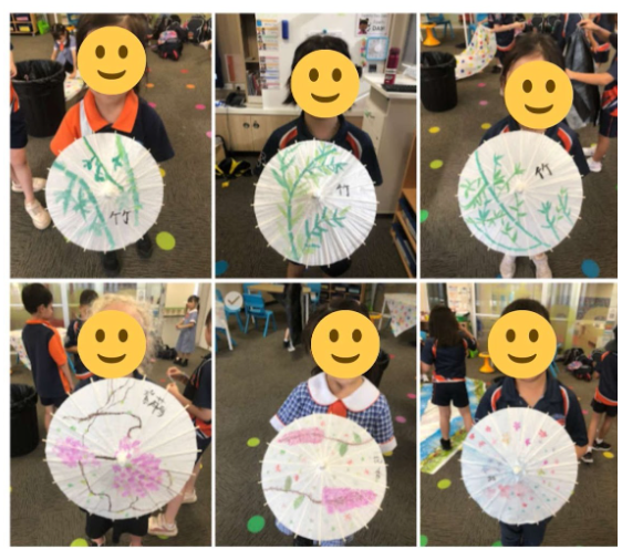 學生以竹子、花卉為題材，在油紙傘上揮灑筆墨，感受傳統工藝之美。